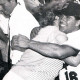 All-Star Game hero and Mass Envelope Manager Jim Mello receives a congratulatory hug from his mother following his explosive game-winning home run in the last of the eight at Fenway Park.