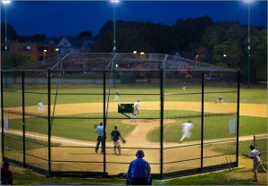 Jim Murphy, a retiree from West Roxbury, enjoyed a free front-row seat for a game at Fallon Field in Roslindale Wednesday night.